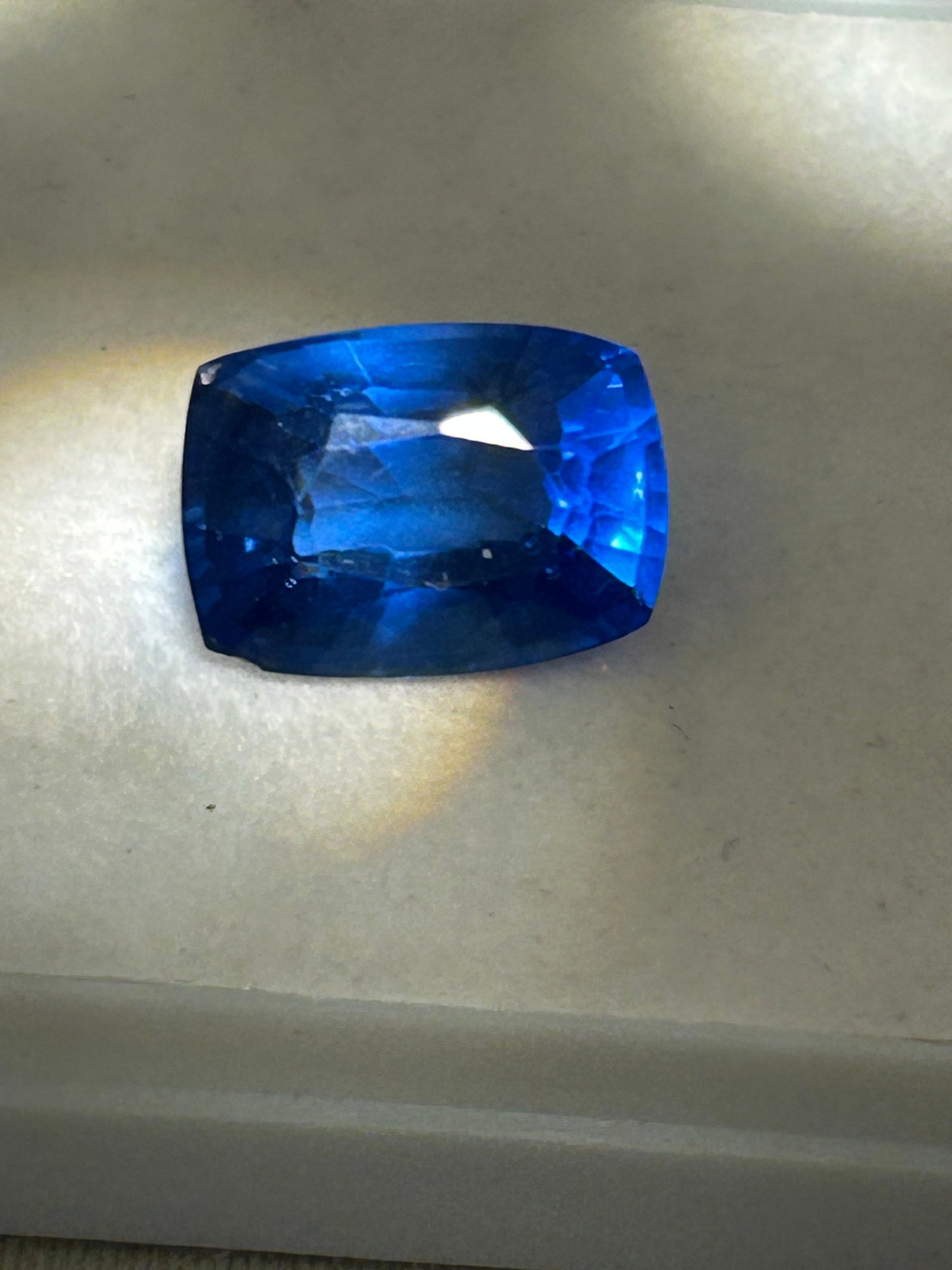 10 Carat --- Natural Blue Sapphire ---- Mixed Cushion Cut: Breathtaking elegance meets timeless luxury in this magnificent 10.00-carat natural blue sapphire. Masterfully fashioned into a mixed cushion cut, this investment-grade gemstone perfectly bridges clas