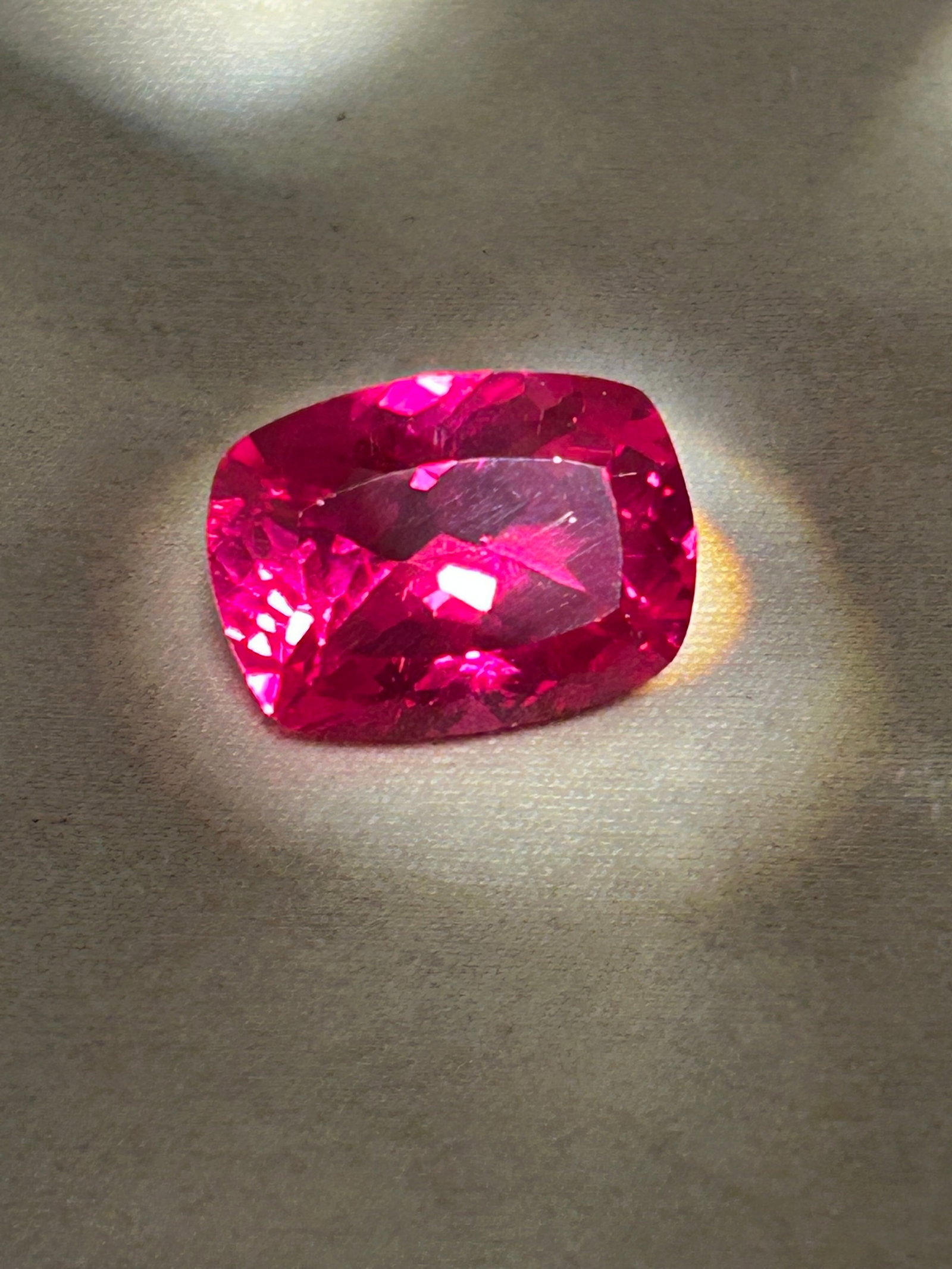 14.00 Carat ---- Natural Myanmar Pink Ruby--- Brilliant Oval Cushion Cut: A 14.00-carat natural Myanmar (Burma) ruby is an exceptionally rare and valuable gemstone. The brilliant oval cushion cut maximizes the gem's brilliance and light return, beautifully showcasing a vibr