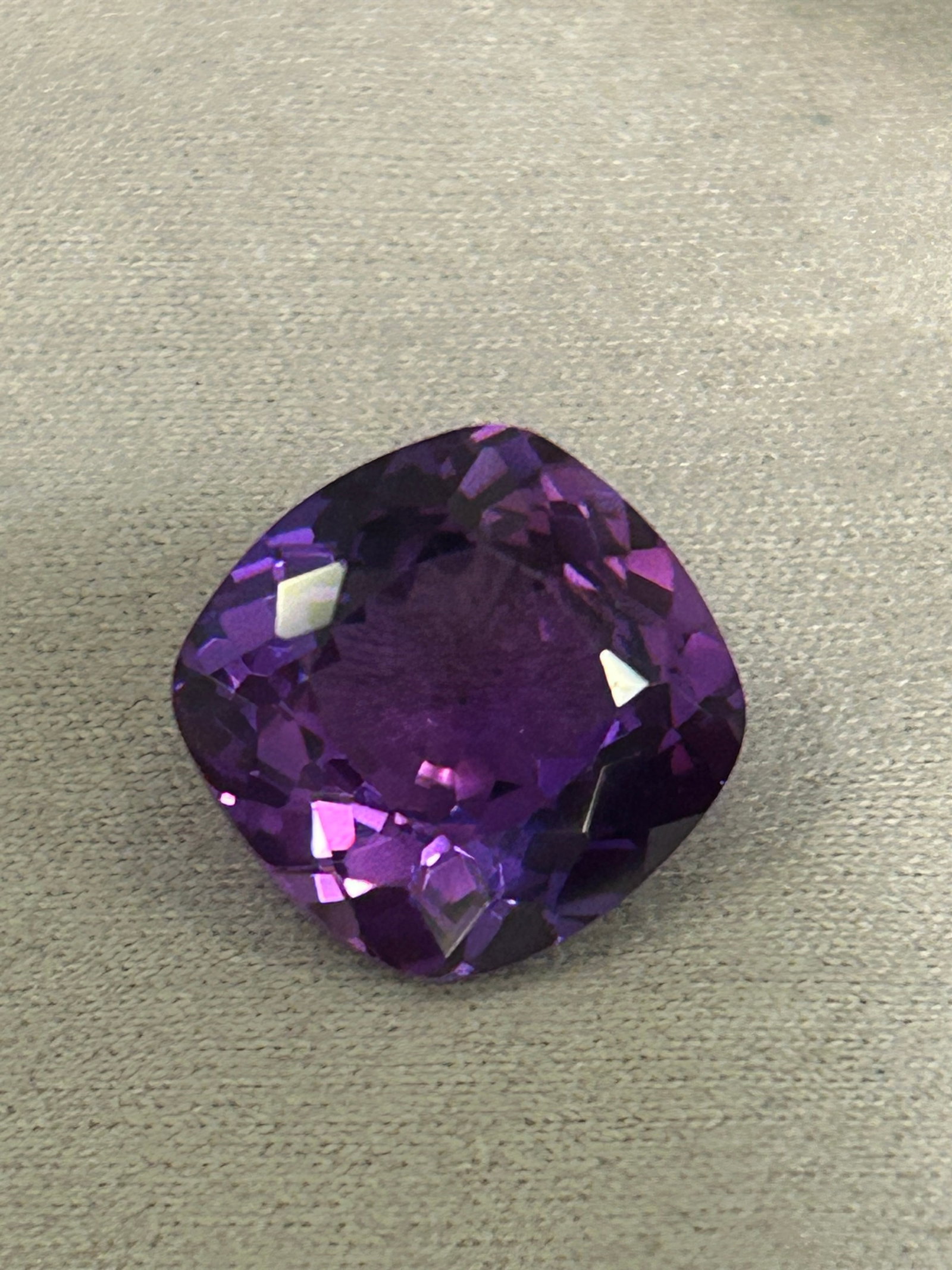 7.00 Carat -- Natural Ceylon Purple Sapphire -- Cushion Cut: World-renowned for producing sapphires with exceptional clarity and brilliance. Purple sapphires are highly sought after as a rare, vibrant alternative to traditional blue sapphires.