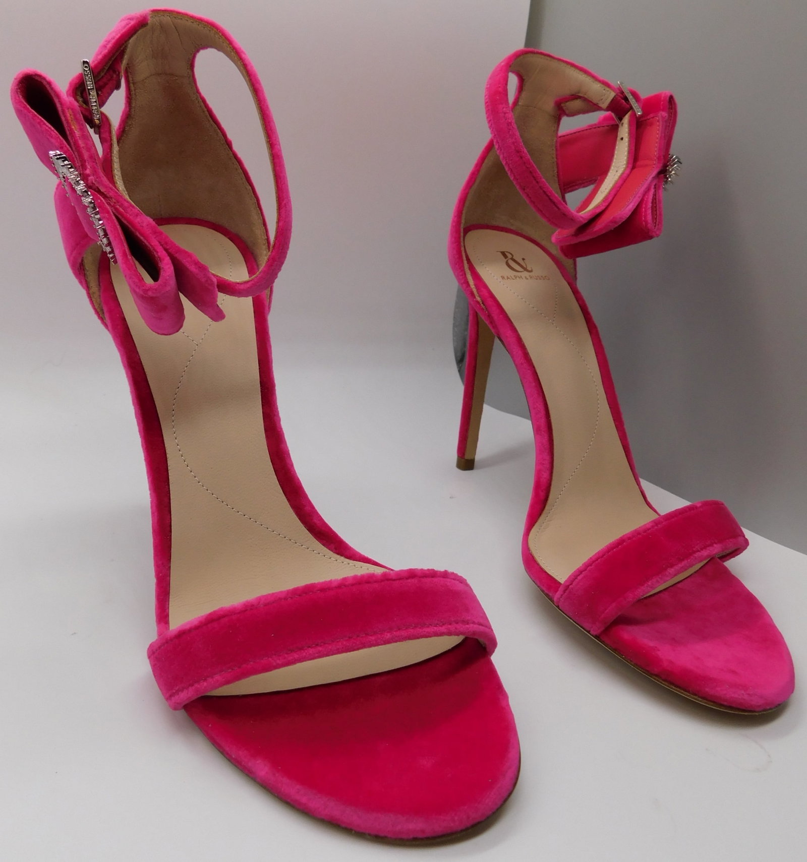 Pair of Ralph & Russo Bow Sandals, Velvet Fabric, Hot Pink/ Swarovski Buckle, With Box & Dust Bags.: Pair of Ralph & Russo Bow Sandals, Velvet Fabric, Hot Pink/ Swarovski Buckle, With Box & Dust Bags. EU Size 40. (RRP £625) Master refined minimalism in the Bow Sandal.