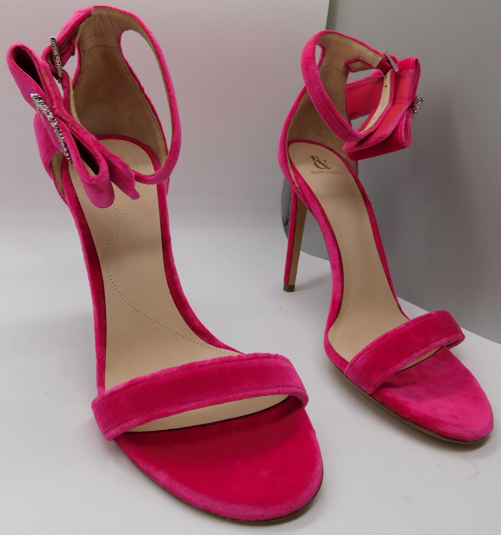 Pair of Ralph & Russo Bow Sandals, Velvet Fabric, Hot Pink/ Swarovski Buckle, With Box & Dust Bags.: Pair of Ralph & Russo Bow Sandals, Velvet Fabric, Hot Pink/ Swarovski Buckle, With Box & Dust Bags. EU Size 37. (RRP £625) Master refined minimalism in the Bow