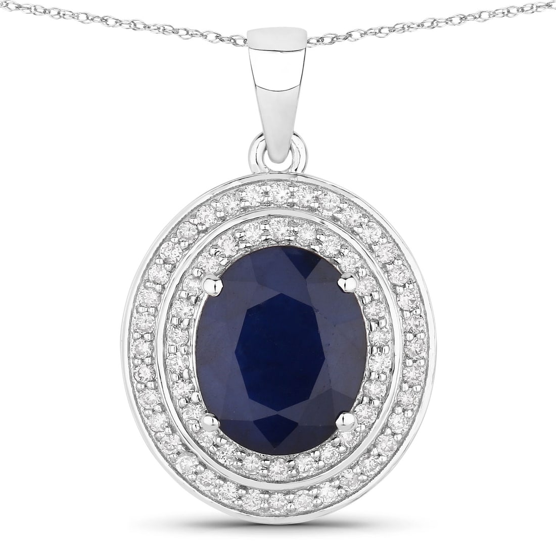 4.82 ctw Blue Sapphire Halo 14K White Gold Pendant - Certified: A symphony of light and color, this piece embodies the pinnacle of luxury. This 4.82 ctw design features a magnificent 4.32 carat Blue Sapphire with velvety hues, surrounded by a scintillating halo of