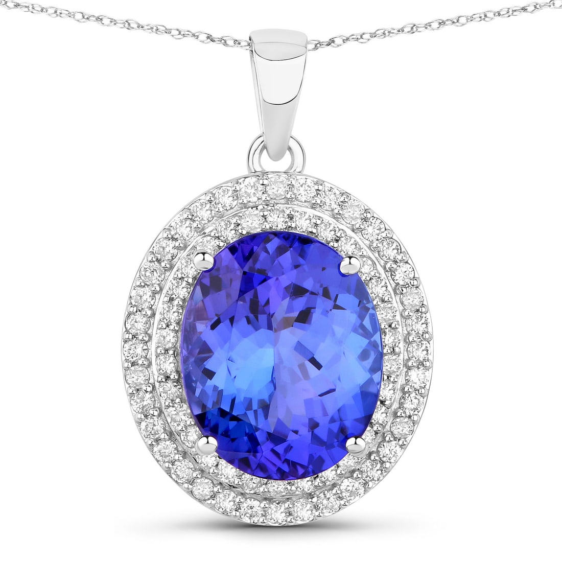 3.90 ctw Tanzanite Halo 14K White Gold Pendant - Certified: A symphony of light and color, this piece embodies the pinnacle of luxury. This 3.90 ctw design features a magnificent 3.53 carat tanzanite with velvety hues, enhanced by a sparkling halo of accent di