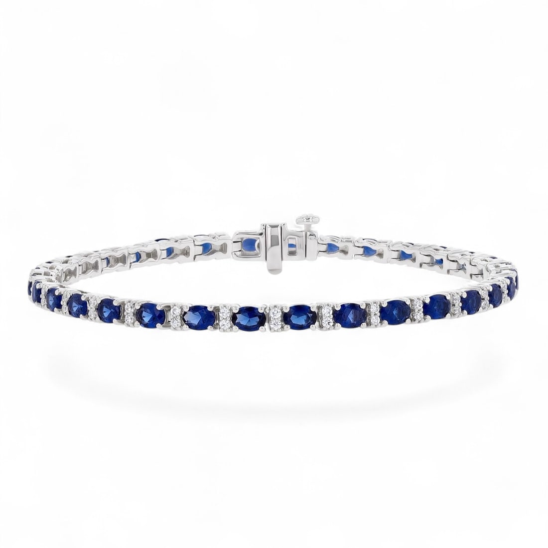 4x3 MM Blue Sapphires and 0.33 Ctw Precious White Diamond Modern 14K White Gold Bracelet - Certified: Exuding opulence and grace, this exquisite Precious bracelet featuring Blue Sapphires, and Natural Diamonds is crafted for the distinguished. A detailed Prong gallery secures the stones, rendered in 1