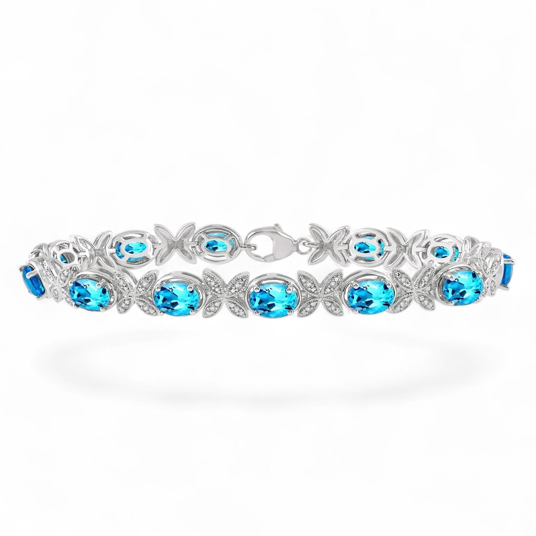 7x5 MM Blue Topaz and 0.11 Ctw Floral Lattice White Diamond Modern Sterling Silver Bracelet - (1 of 3)