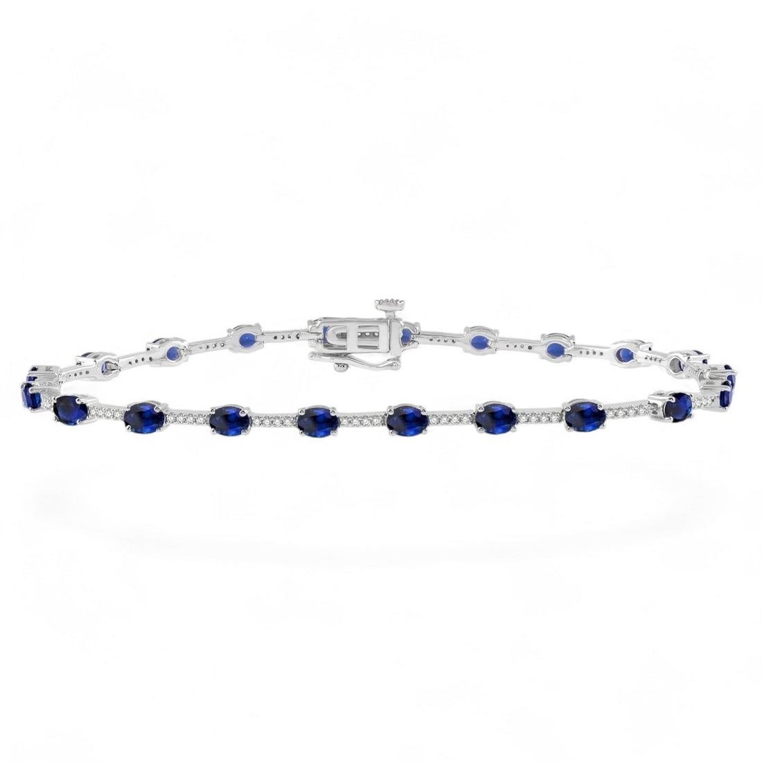 4x3 MM Blue Sapphire and 0.34 Ctw Precious White Diamond Modern 10K White Gold Bracelet - Certified: Epitomizing grandeur, this magnificent Precious bracelet featuring Natural Diamonds and Sapphires stands as a beacon of refined taste. Showcasing the gems in a Prong arrangement, the bracelet consists