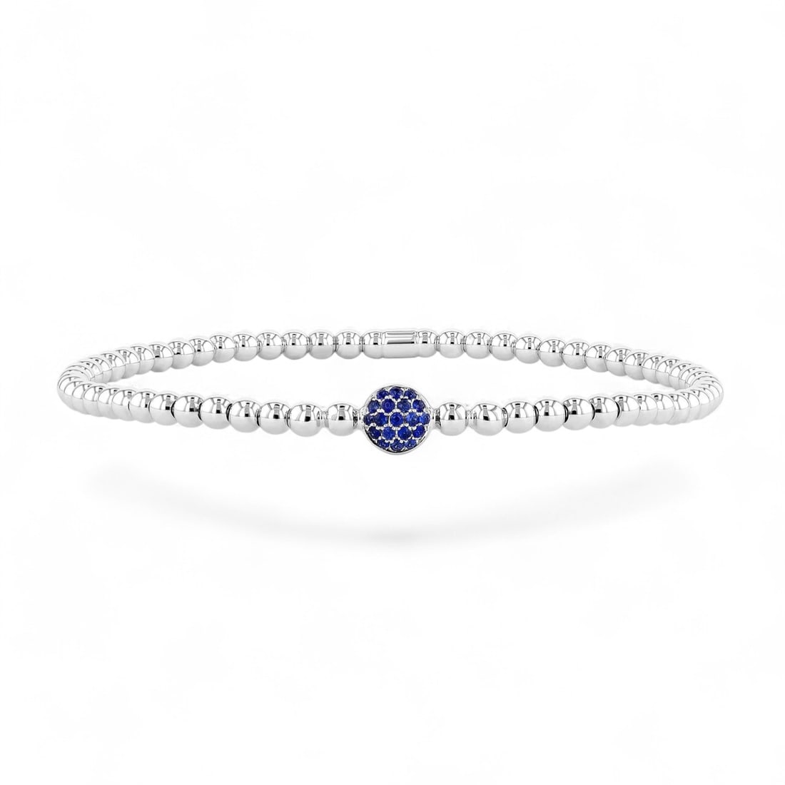 Gold Bead Pave Disc Center Stretch Blue Sapphire Modern 18K White Gold Bracelet - Certified: Defining modern elegance, this magnificent Bead With Gemstone Pave Disc Center Stretch bracelet featuring Natural Blue Sapphires captures the essence of style. Securely held in a classic Pave design,