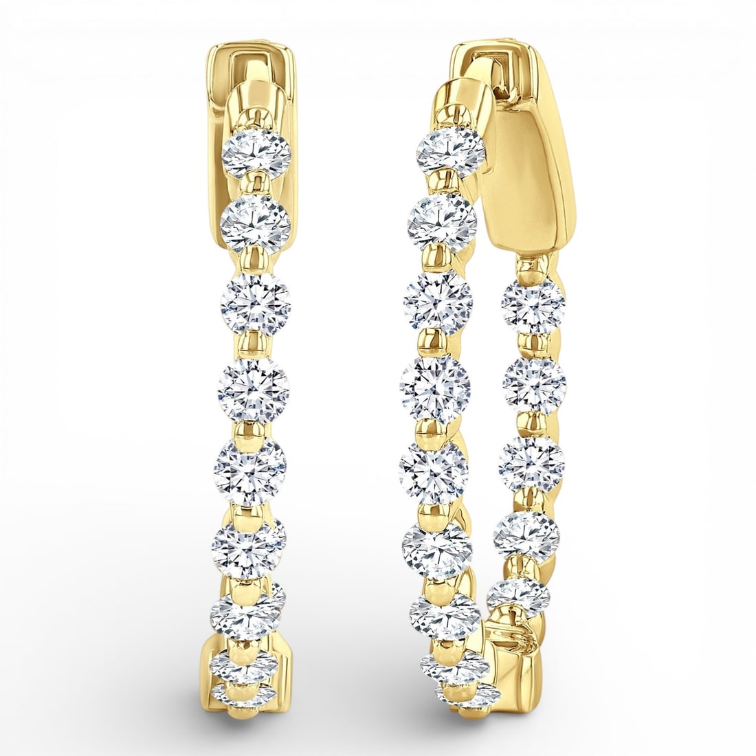 1.02 ctw Diamond Inside-Out Hoop 14K Yellow Gold Earrings: Timeless and sophisticated, this elegant Inside-Out Hoop pair of earrings featuring White Diamond radiates enduring beauty. Securely held in a classic Hoop design, the earrings are forged from 3.8 gra