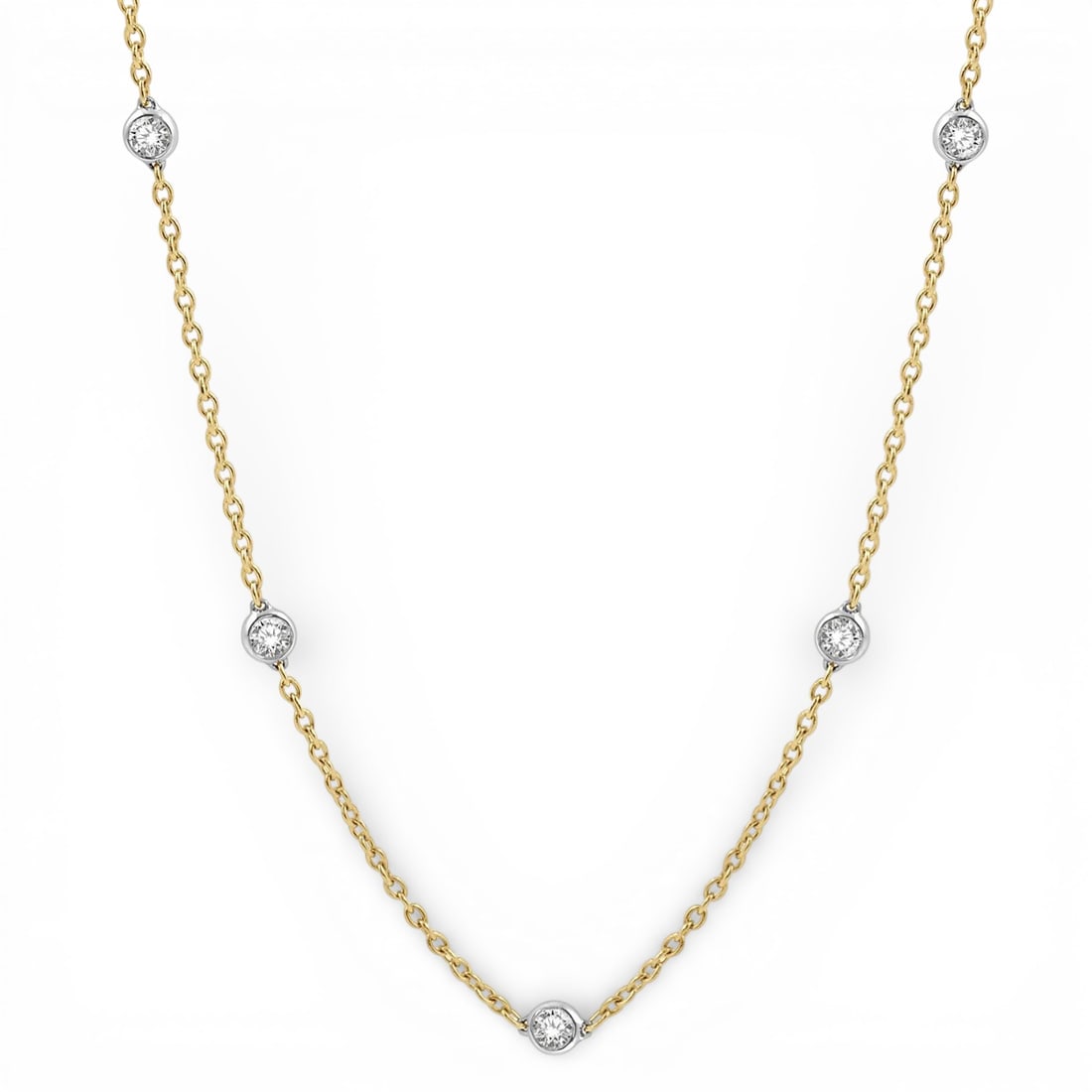 1.51 ctw Diamond Station 14K Yellow and White Gold Necklace: A symphony of light and color, this stunning Station necklace featuring Natural Diamonds embodies the pinnacle of luxury. The gemstones are nestled within a Bezel framework, supported by a substantial