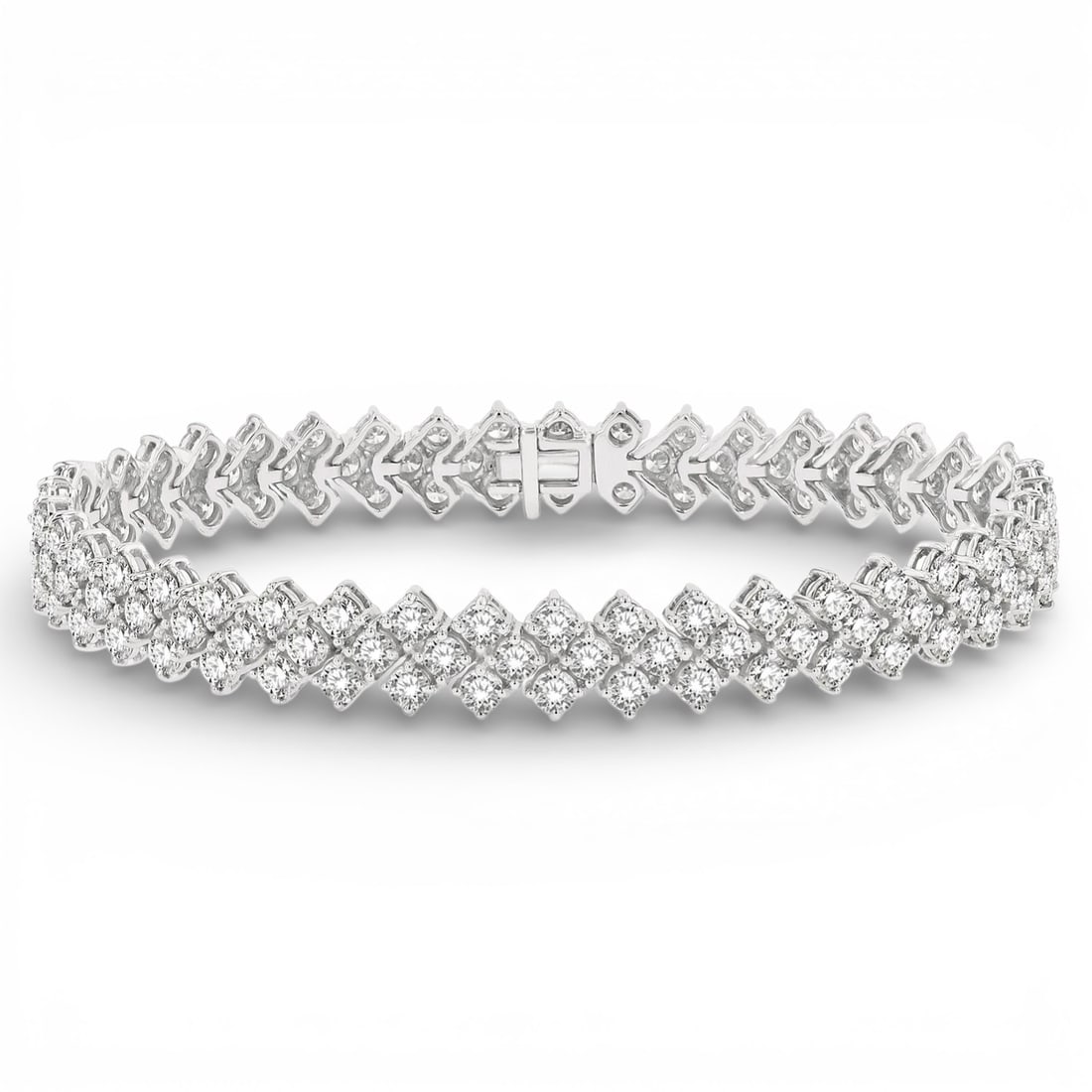 10.09 ctw Diamond Chevron Link 14K White Gold Tennis Bracelet: A symphony of light and color, this stunning Chevron Link bracelet featuring White Diamond embodies the pinnacle of luxury. Expertly mounted in a Link setting, the bracelet is crafted in 14.1 grams of