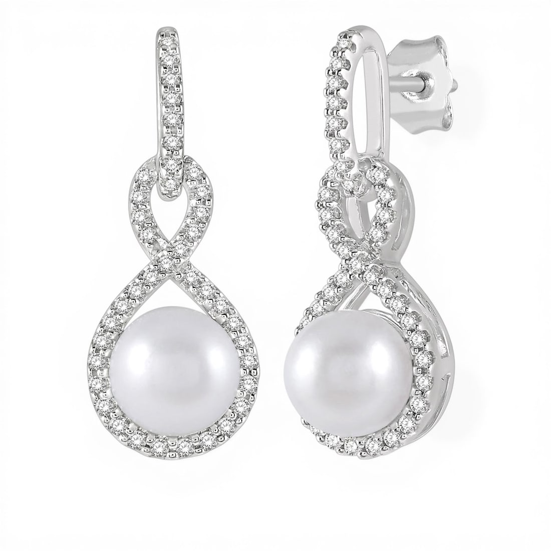 6mm Cultured Pearl and 0.25ctw Diamond 10K White Gold Earrings: A vision of luxury, this elegant Twisted Loop pair of earrings featuring Cultured Pearl, White Diamond defines sophistication. Expertly mounted in a Drop/Dangle setting, the earrings are crafted in 1.