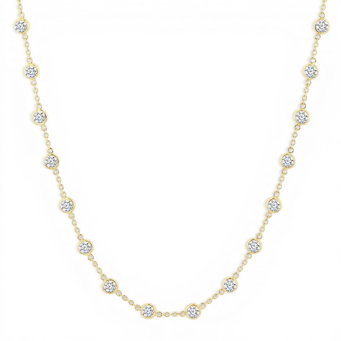 5.04ctw Bezel Set Round Diamond Station 14K Yellow Gold Necklace: Rare and radiant, this breathtaking Station necklace featuring White Diamond offers a touch of the extraordinary. Crafted with precision, the Station setting is seamlessly integrated into 7.1 grams of