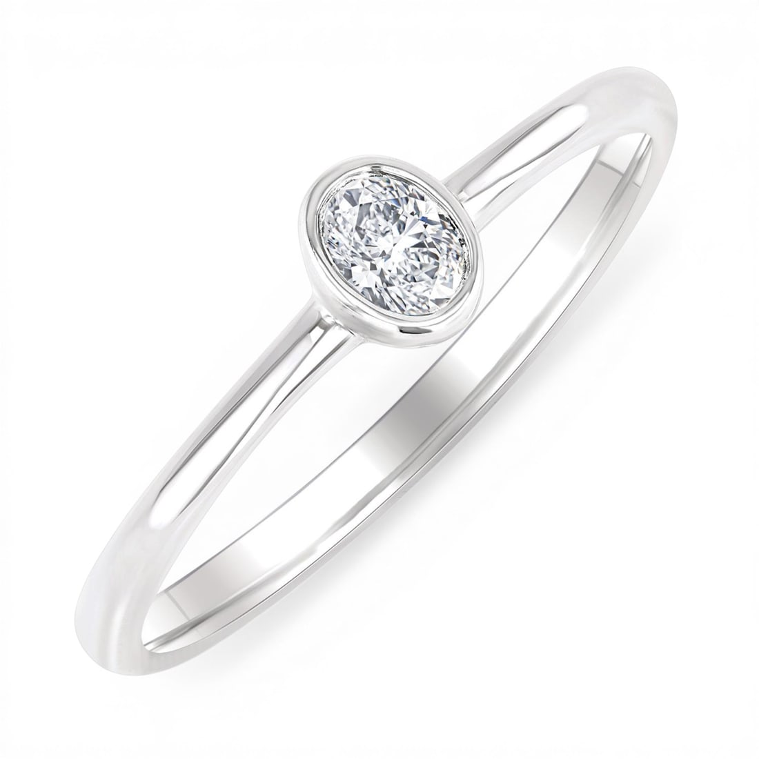 0.16ctw Oval White Diamond Petite Bezel Set 10K White Gold Ring: Exuding opulence and grace, this elegant Petite Bezel Set ring featuring White Diamond is crafted for the distinguished. A detailed Bezel gallery secures the stones, rendered in 1.55 grams of lustrous