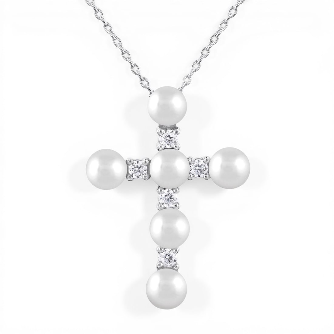 4mm Cultured Pearl and 0.15ctw Diamond Cross 10K White Gold Pendant: Rare and radiant, this elegant Cross necklace featuring Cultured Pearl, White Diamond offers a touch of the extraordinary. A detailed Cluster gallery secures the stones, rendered in 1.0 grams of lustr