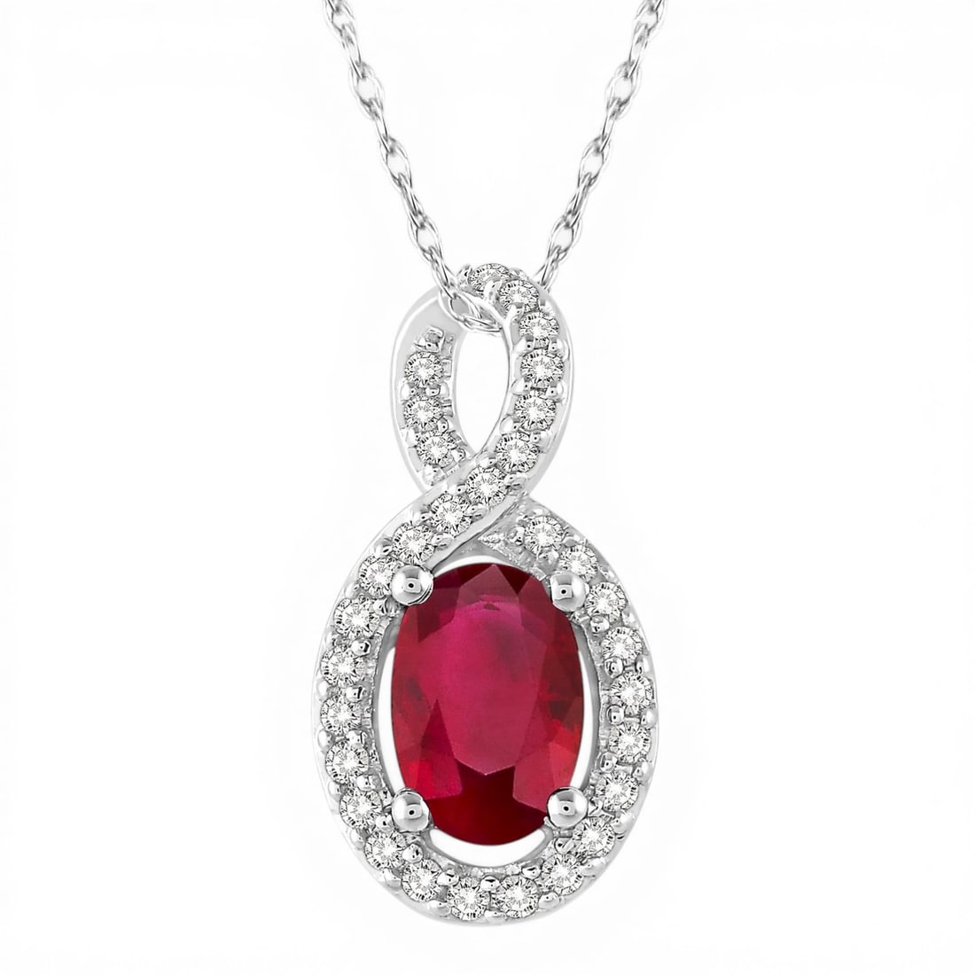 6x4mm Ruby and 0.10ctw Diamond 10K White Gold Pendant Necklace: Epitomizing grandeur, this stunning Halo pendant necklace featuring Ruby, White Diamond stands as a beacon of refined taste. A detailed Halo gallery secures the stones, rendered in 1.05 grams of lustr