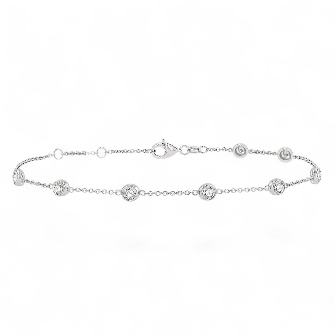 0.99 Ctw Circular Mount Station White Diamond Modern 14K White Gold Bracelet - Certified: Exuding opulence and grace, this elegant Station bracelet featuring Natural Diamonds is crafted for the distinguished. Showcasing the gems in a Bezel arrangement, the bracelet consists of 2.65 grams o