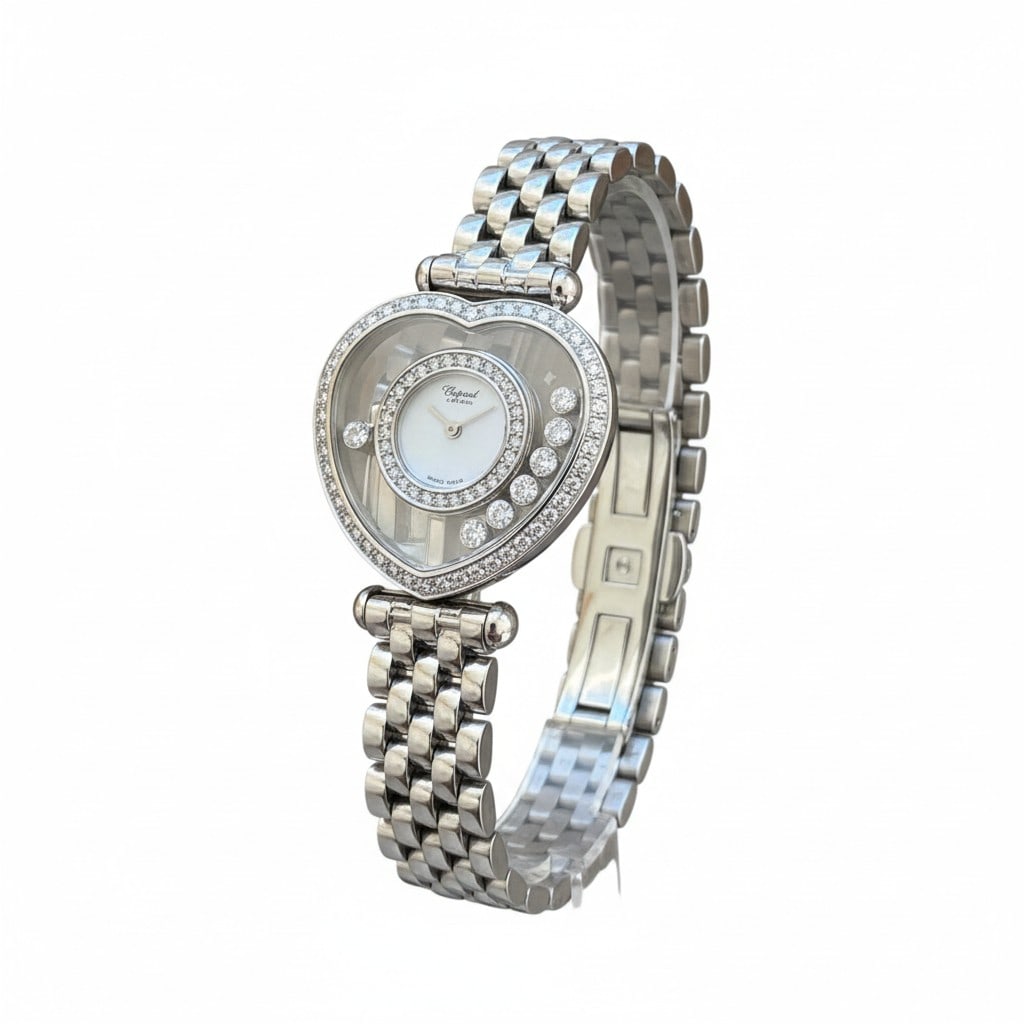 Chopard Happy Diamonds 18k White Gold Heart Diamond Bezel 7 Floating Diamonds: This exquisite Chopard Happy Diamonds ladies' watch is a masterpiece of romantic design, featuring an iconic 25mm heart-shaped case crafted in solid 18k white gold. The bezel is meticulously set with