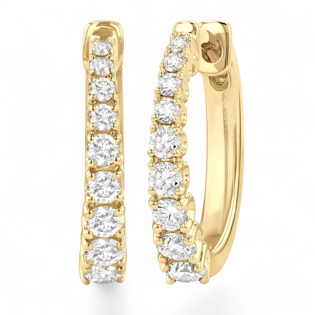 0.52 Ctw Graduated Hoop White Diamond Modern 14K Yellow Gold Earrings - Certified: Epitomizing grandeur, this stunning Graduated Hoop pair of earrings featuring Natural Diamonds stands as a beacon of refined taste. A detailed Prong gallery secures the stones, rendered in 2.7 grams o