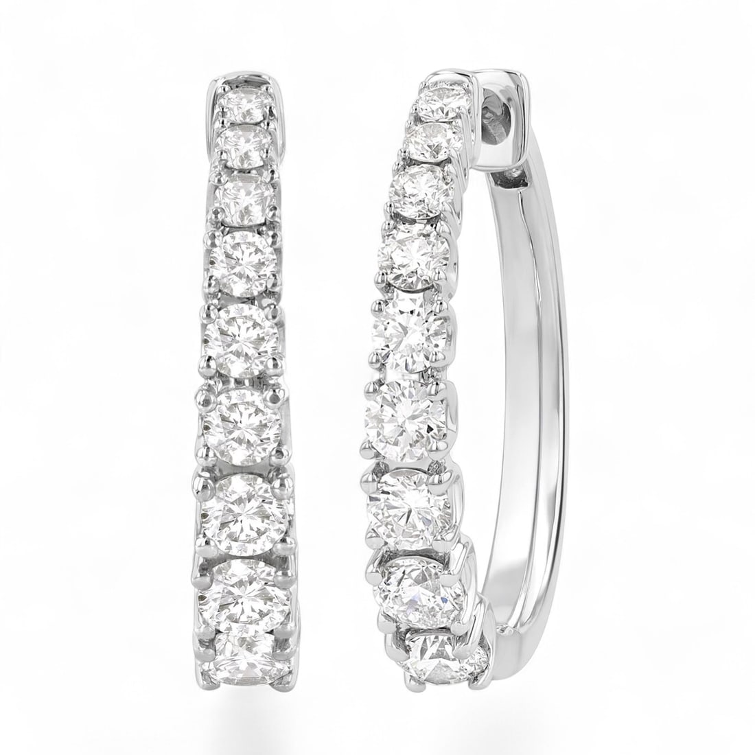 1.05 Ctw Graduated Round Cut Fashion Hoop White Diamond Modern 14K White Gold Earrings - Certified: Rare and radiant, this stunning Graduated Round Cut Fashion Hoop pair of earrings featuring Natural Diamonds offers a touch of the extraordinary. Crafted with precision, the Prong setting is seamlessl