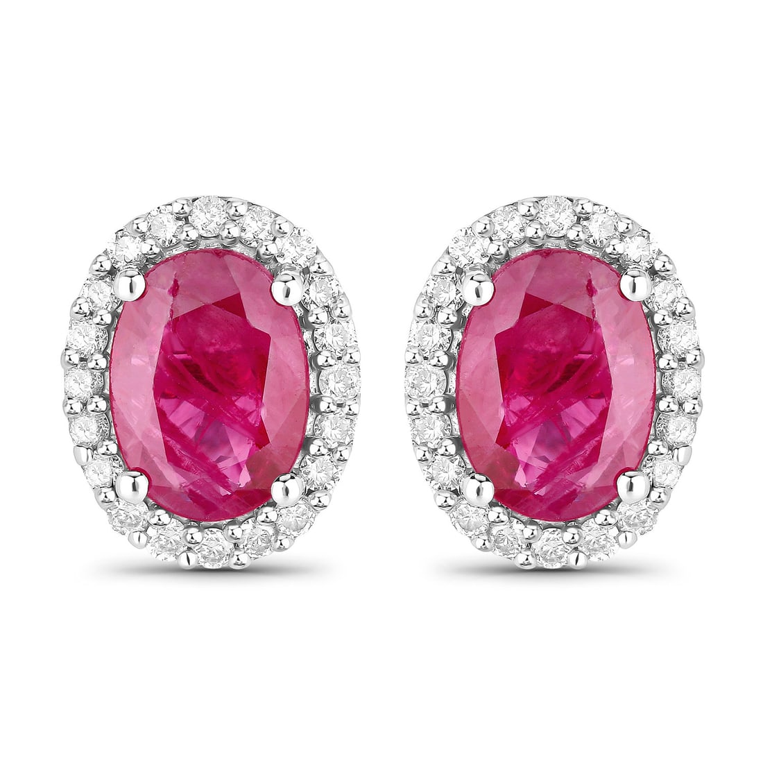 1.96 CTW Oval Ruby Modern 14K White Gold Earrings - Certified: Exuding opulence and grace, this exquisite pair of earrings is crafted for the distinguished. Expertly mounted in a Prong setting, they are forged from 1.6 grams of solid 14K White Gold. This pair sho