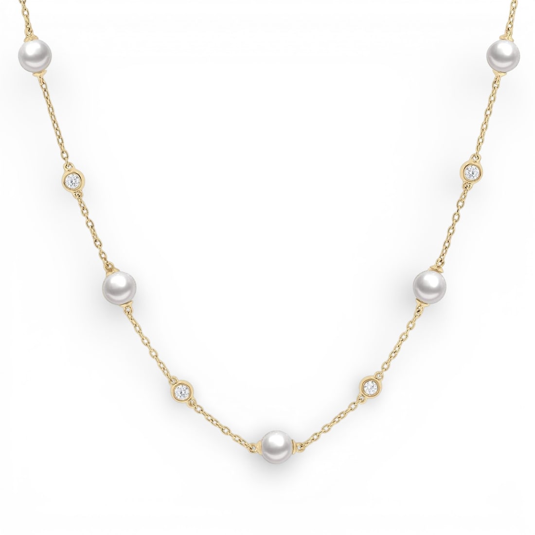 5mm Cultured Pearl and 0.26 ctw Diamond 14K Yellow Gold Necklace: Exuding opulence and grace, this elegant Station necklace featuring Cultured Pearl, White Diamond is crafted for the distinguished. Crafted with precision, the Station setting is seamlessly integrated
