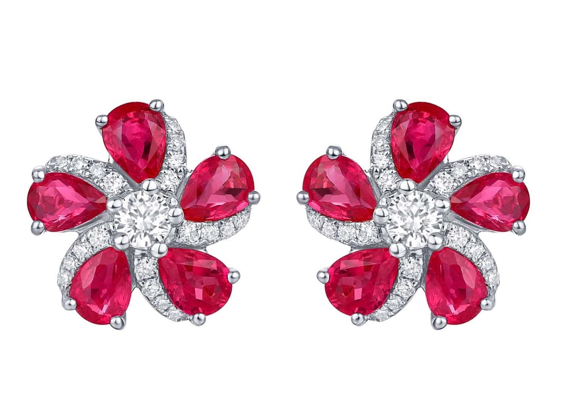 1.57ct Ruby and 0.27ctw Diamond 14K White Gold Stud Earrings: Rare and radiant, this exquisite Cluster Flower pair of earrings featuring Ruby, White Diamond offers a touch of the extraordinary. A detailed Cluster gallery secures the stones, rendered in lustrous