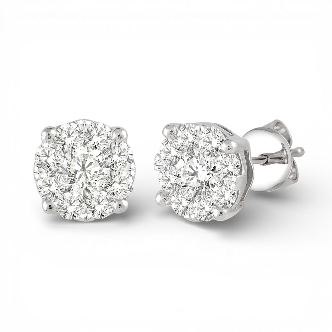 0.76 ctw Diamond Cluster 14K White Gold Stud Earrings: Epitomizing grandeur, this stunning Cluster pair of earrings featuring Natural Diamonds stands as a beacon of refined taste. A detailed Cluster gallery secures the stones, rendered in 2.55 grams of lu