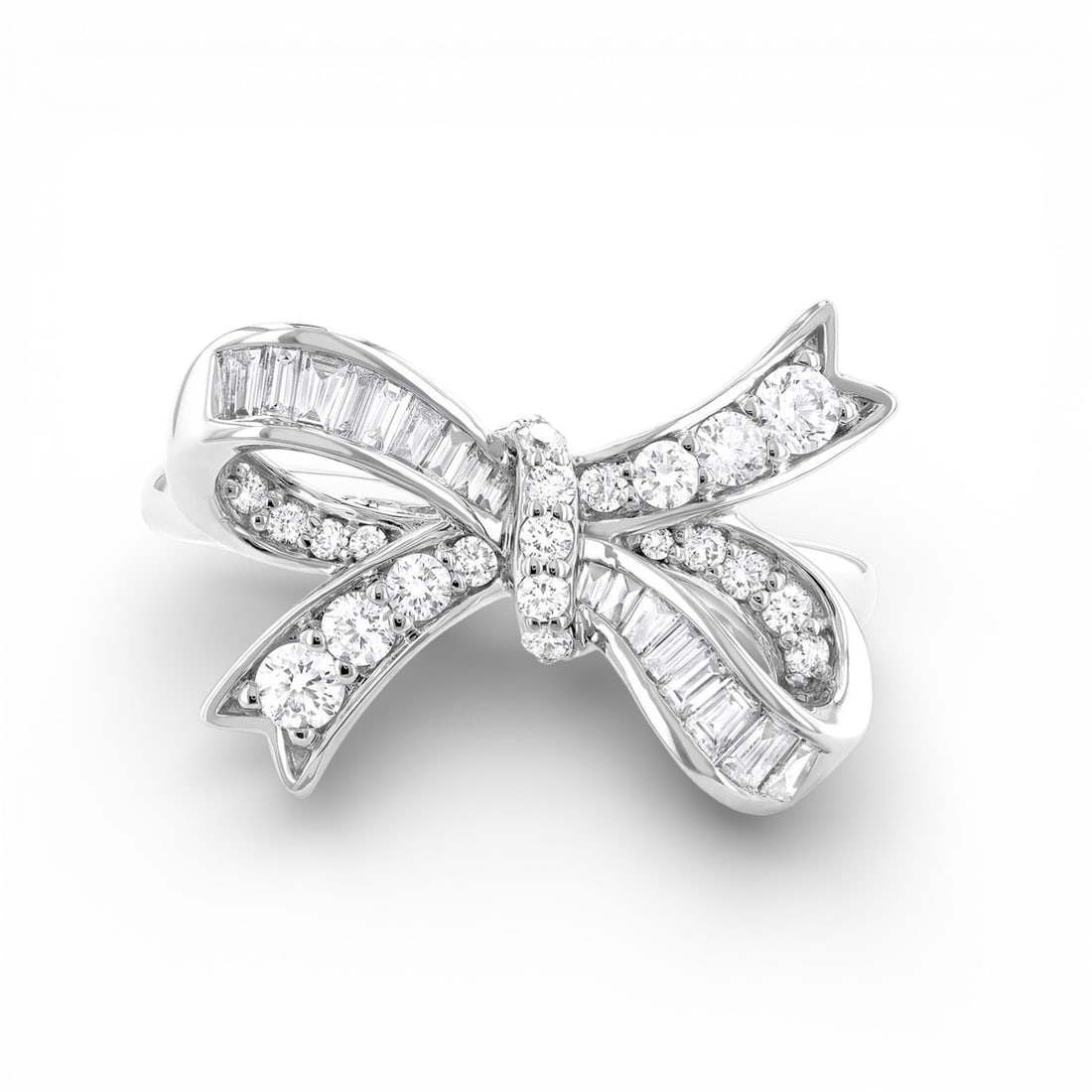 0.68 ctw Bow Tie Diamond Ring 18K White Gold: Rare and radiant, this magnificent Bow Tie ring featuring White Diamond offers a touch of the extraordinary. A detailed Cluster gallery secures the stones, rendered in 6.7 grams of lustrous 18K White