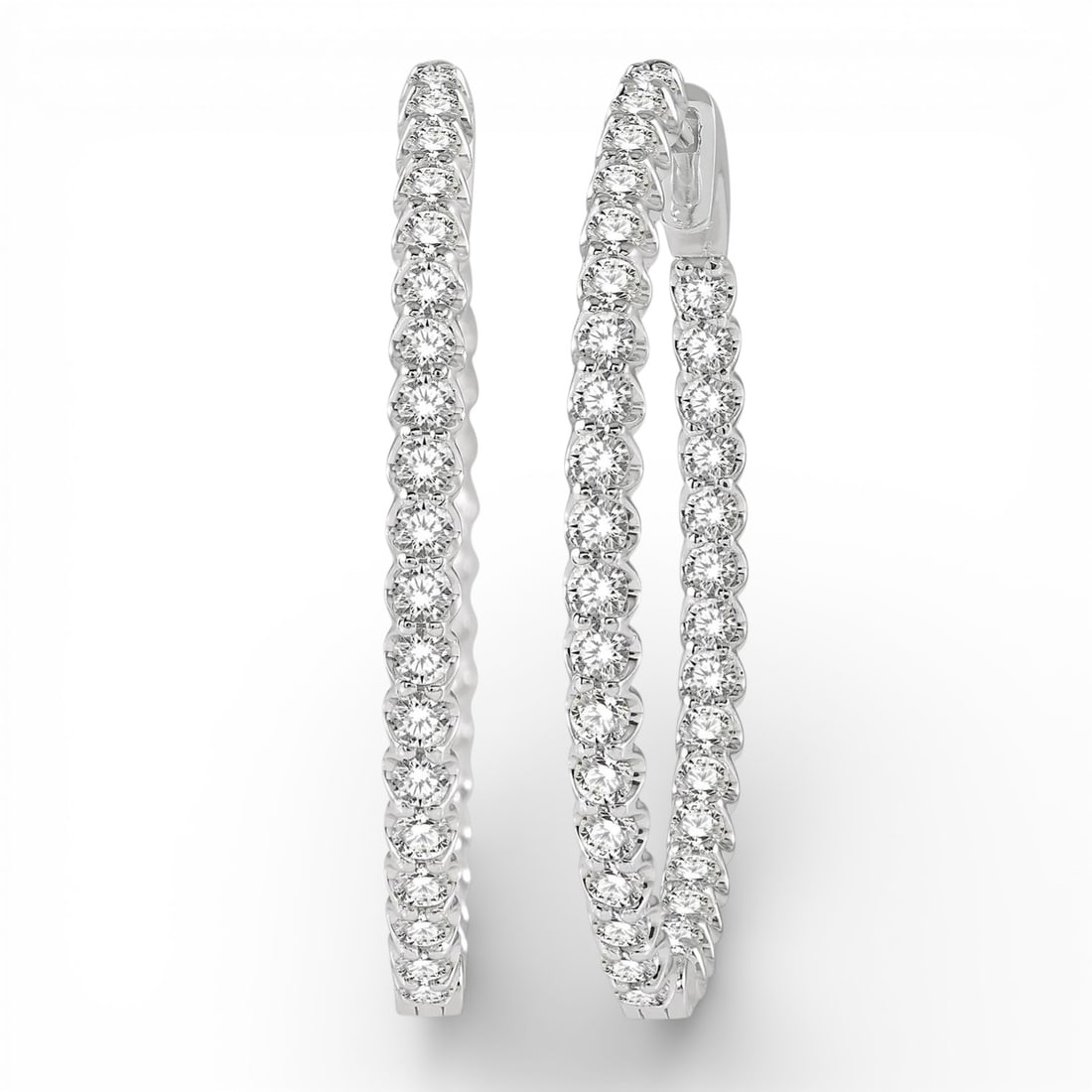 2.01 ctw White Diamond Inside-Out 14K White Gold Hoop Earrings: An exquisite masterpiece of haute joaillerie, this exquisite Inside-Out pair of earrings featuring Natural Diamonds is a true treasure. A detailed Hoop gallery secures the stones, rendered in 6.6 gram
