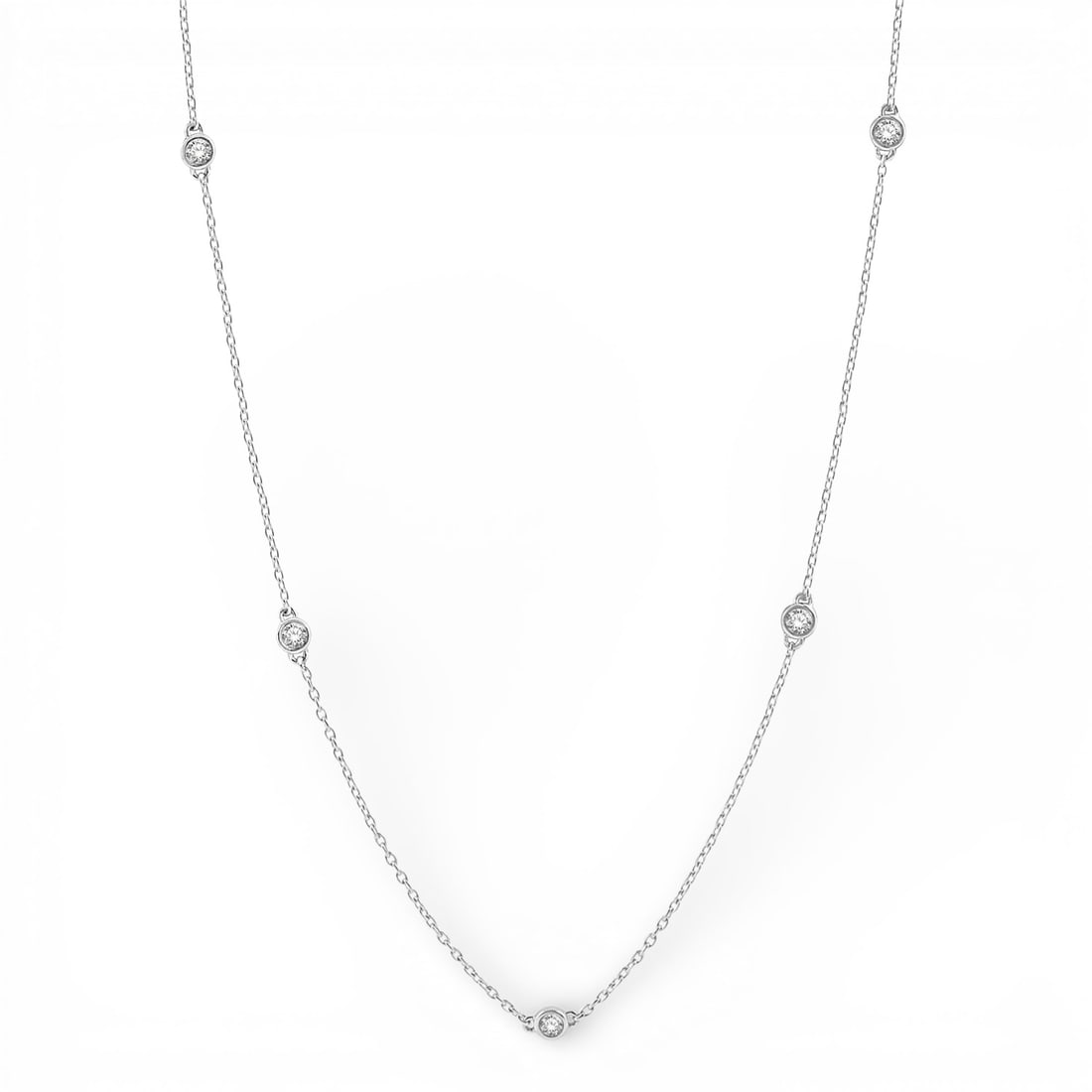 0.76 ctw Diamond 14K White Gold Necklace: A vision of luxury, this elegant Station Necklace featuring White Diamond defines sophistication. Securely held in a classic Station design, the necklace is forged from 2.65 g of high-polish 14K White