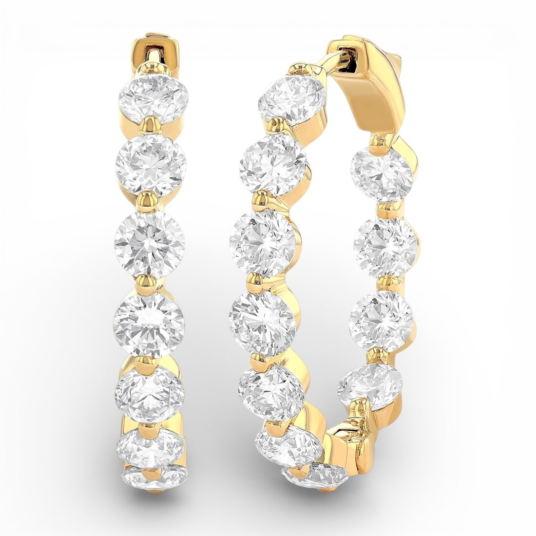 5.06 ctw Inside-Out Diamond Hoop Earrings 14K Yellow Gold: An exquisite masterpiece of haute joaillerie, this magnificent Inside-Out Single Prong Set pair of earrings featuring White Diamond is a true treasure. Crafted with precision, the Inside-Out Hoop sett