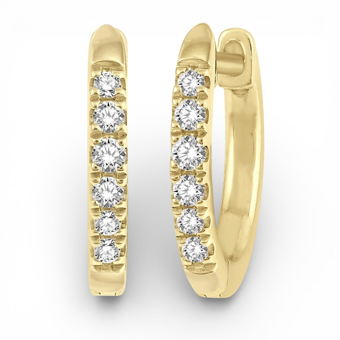 0.12 ctw Diamond Petite Huggie Earrings in 10K Yellow Gold: Epitomizing grandeur, this elegant Petite Huggie pair of earrings featuring White Diamond stands as a beacon of refined taste. A detailed Bar gallery secures the stones, rendered in 1.55 grams of lust
