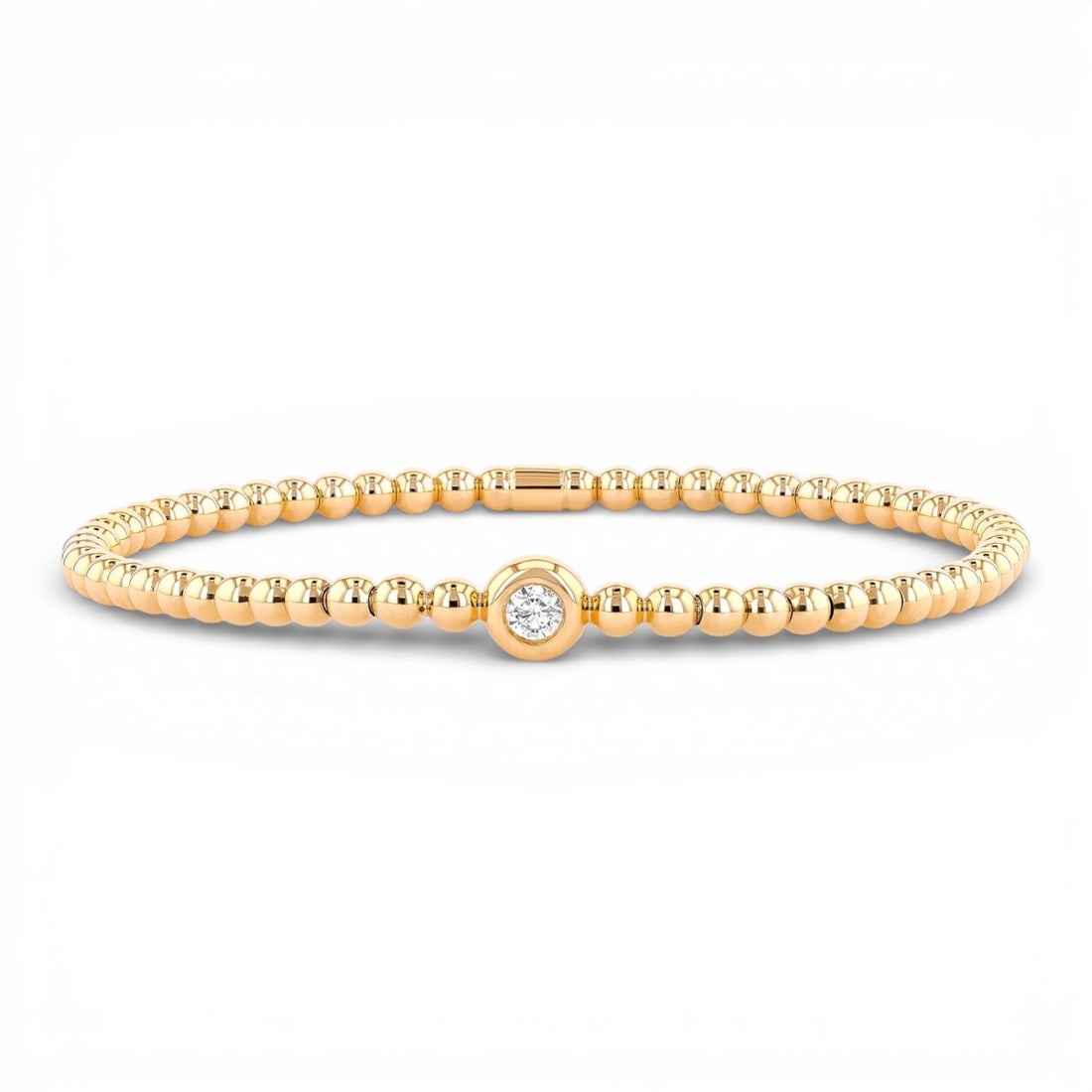 0.10 ctw Diamond Bezel Stretch Bracelet 18K Yellow Gold: Exuding opulence and grace, this elegant Bead bracelet featuring White Diamond is crafted for the distinguished. Crafted with precision, the Solitaire setting is seamlessly integrated into 6.5 grams o