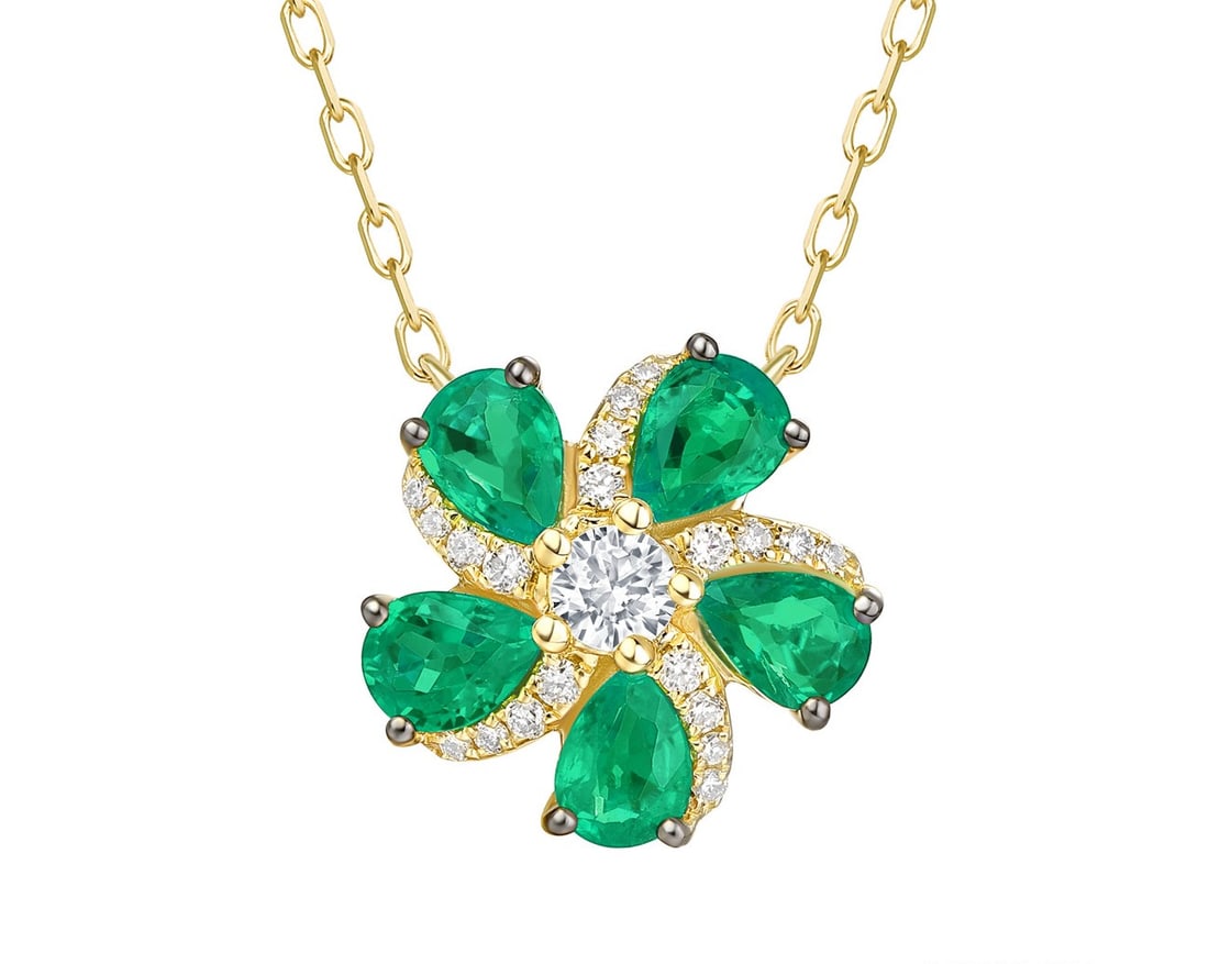 0.65ct Emerald and 0.13ctw White Diamond 14K Yellow Gold Pendant: Timeless and sophisticated, this exquisite Floral Design pendant featuring Emerald, White Diamond radiates enduring beauty. Expertly mounted in a Cluster setting, the pendant is crafted in solid 14K Y