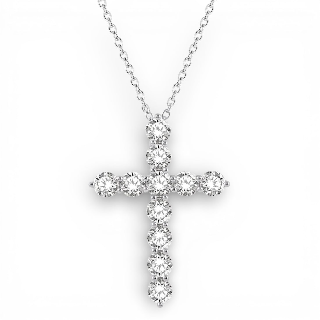 4.07 ctw White Diamond Cross Pendant 14K White Gold: Timeless and sophisticated, this breathtaking Cross pendant necklace featuring White Diamond radiates enduring beauty. The gemstones are nestled within a Prong framework, supported by a substantial 2.