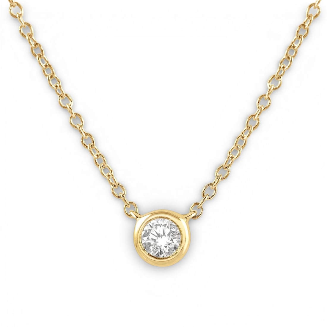 0.10 ctw Diamond 10K Yellow Gold Pendant Necklace: An exquisite masterpiece of haute joaillerie, this elegant Petite pendant necklace featuring White Diamond is a true treasure. Showcasing the gems in a Bezel arrangement, the pendant necklace consists