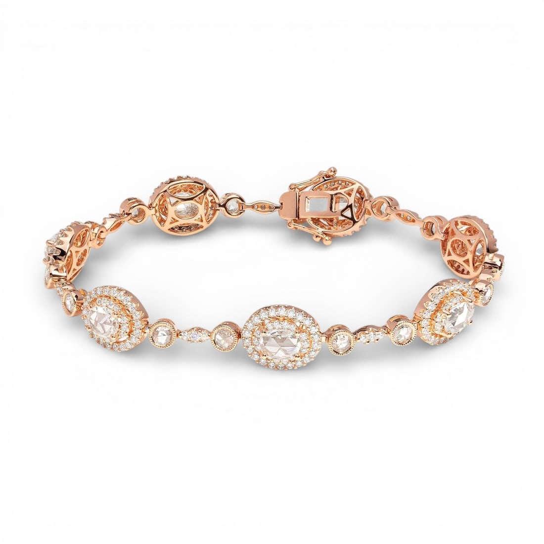 6.05 ctw Diamond Mademoiselle Floral 18K Rose Gold Bracelet: Exuding opulence and grace, this magnificent Floral bracelet featuring Natural Diamonds is crafted for the distinguished. Showcasing the gems in a Halo arrangement, the bracelet consists of 16.75 gram