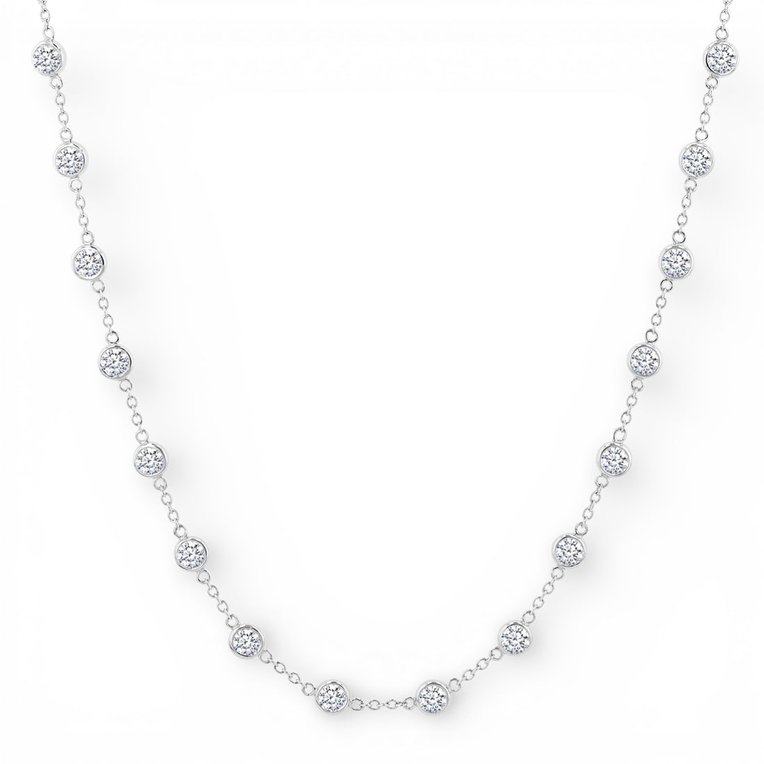 5.04 ctw Diamond Station 14K White Gold Necklace: Rare and radiant, this stunning Bezel Set Station necklace featuring White Diamond offers a touch of the extraordinary. A detailed Station gallery secures the stones, rendered in 7.1 grams of lustrous