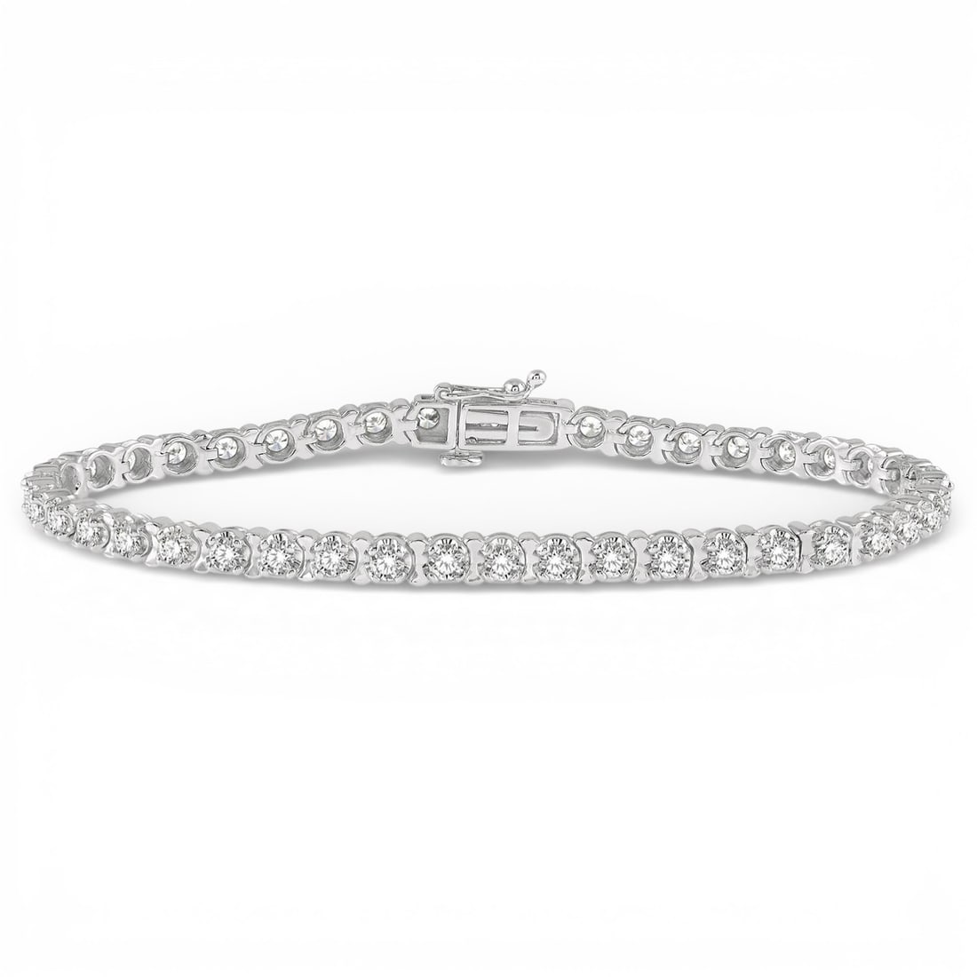 3.02 ctw Diamond Tulip 14K White Gold Tennis Bracelet: Rare and radiant, this breathtaking Tulip bracelet featuring White Diamond offers a touch of the extraordinary. Crafted with precision, the Prong setting is seamlessly integrated into 10.9 g of 14K Wh
