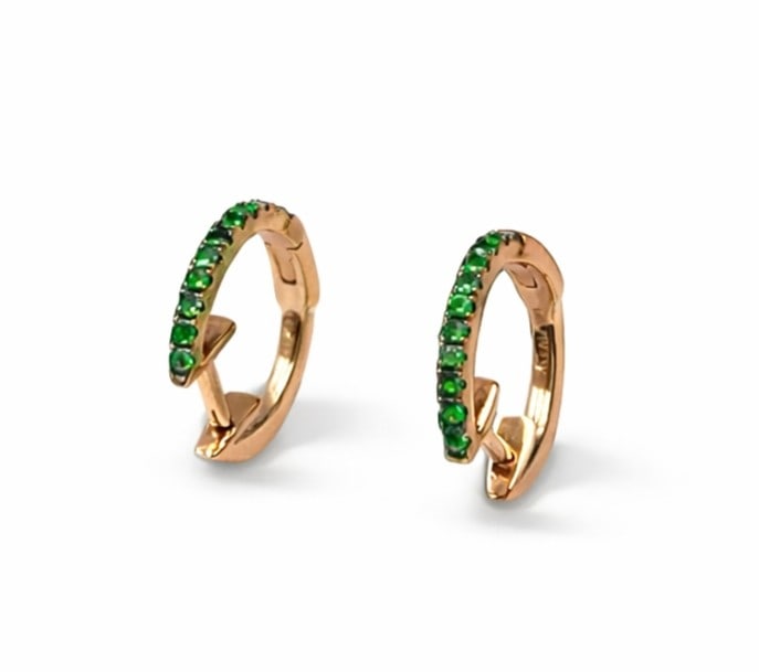 0.21ctw Green Garnet Pave 14K Yellow Gold Huggies Earrings: A testament to superior craftsmanship, this elegant Huggies pair of earrings featuring Tsavorite is unparalleled. A detailed Pave gallery secures the stones, rendered in 1.88 grams of lustrous 14K Yel