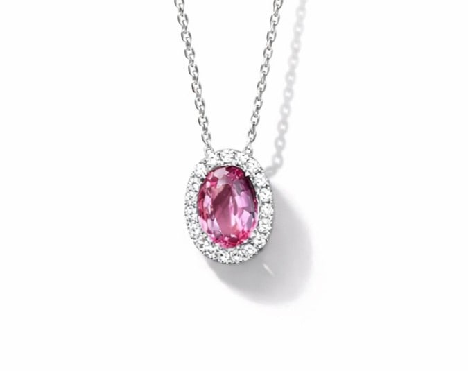 1.59ct Pink Sapphire and 0.20ctw Diamond 14K White Gold Pendant: A symphony of light and color, this stunning Halo pendant featuring Pink Sapphire, White Diamond embodies the pinnacle of luxury. Expertly mounted in a Halo setting, the pendant is crafted in 2.8 gram