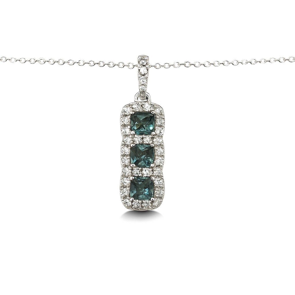 0.50ct Alexandrite and 0.33ctw Diamond 14K White Gold Pendant: A vision of luxury, this magnificent Three-stone halo drop pendant featuring Alexandrite, White Diamond defines sophistication. Securely held in a classic Halo design, the pendant is forged from 1.71