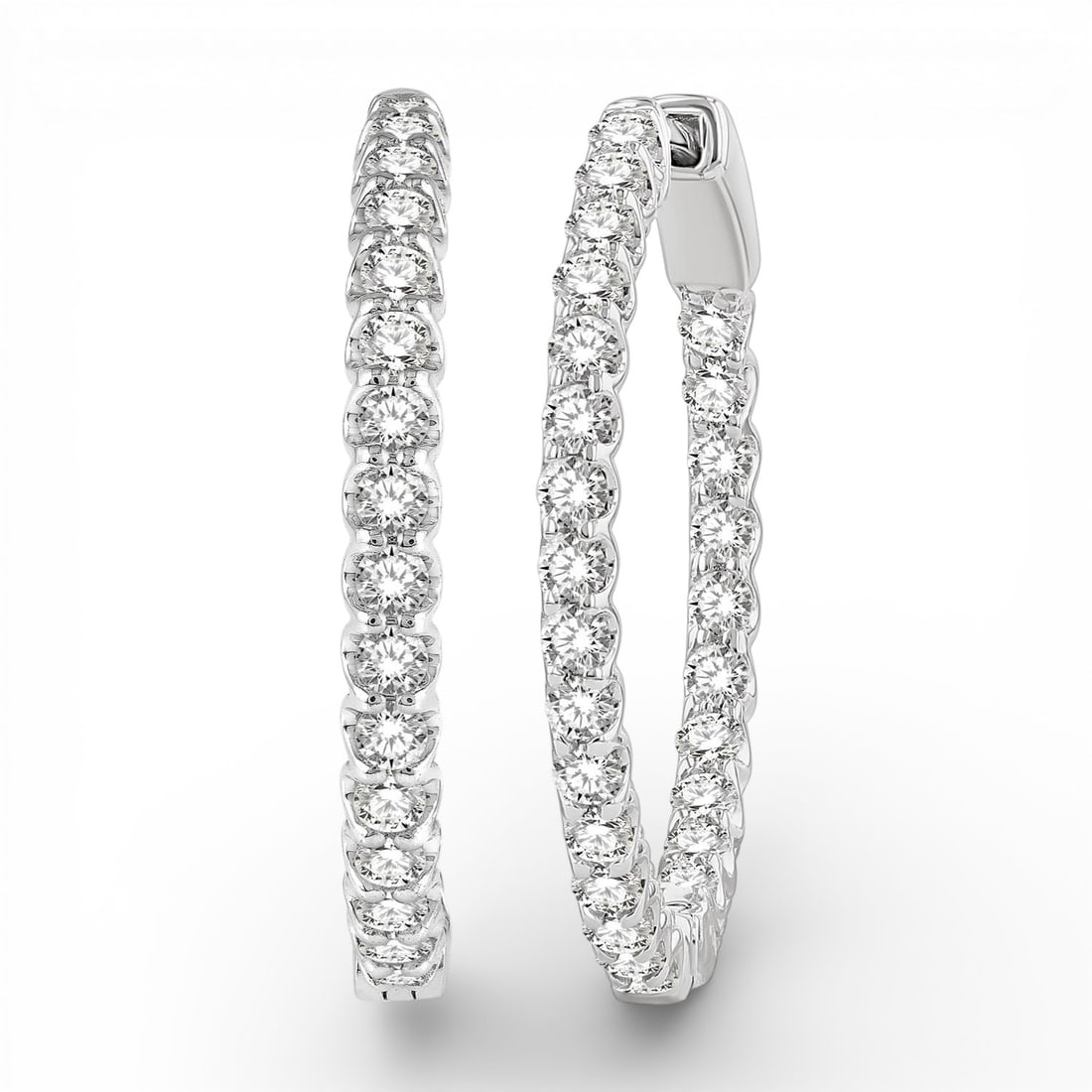 1.53 ctw Inside-Out Diamond Hoop Earrings 14K White Gold: Captured in a moment of brilliance, this stunning Inside-Out pair of earrings featuring White Diamond speaks to the connoisseur. Expertly mounted in a Shared Prong setting, the earrings are crafted in