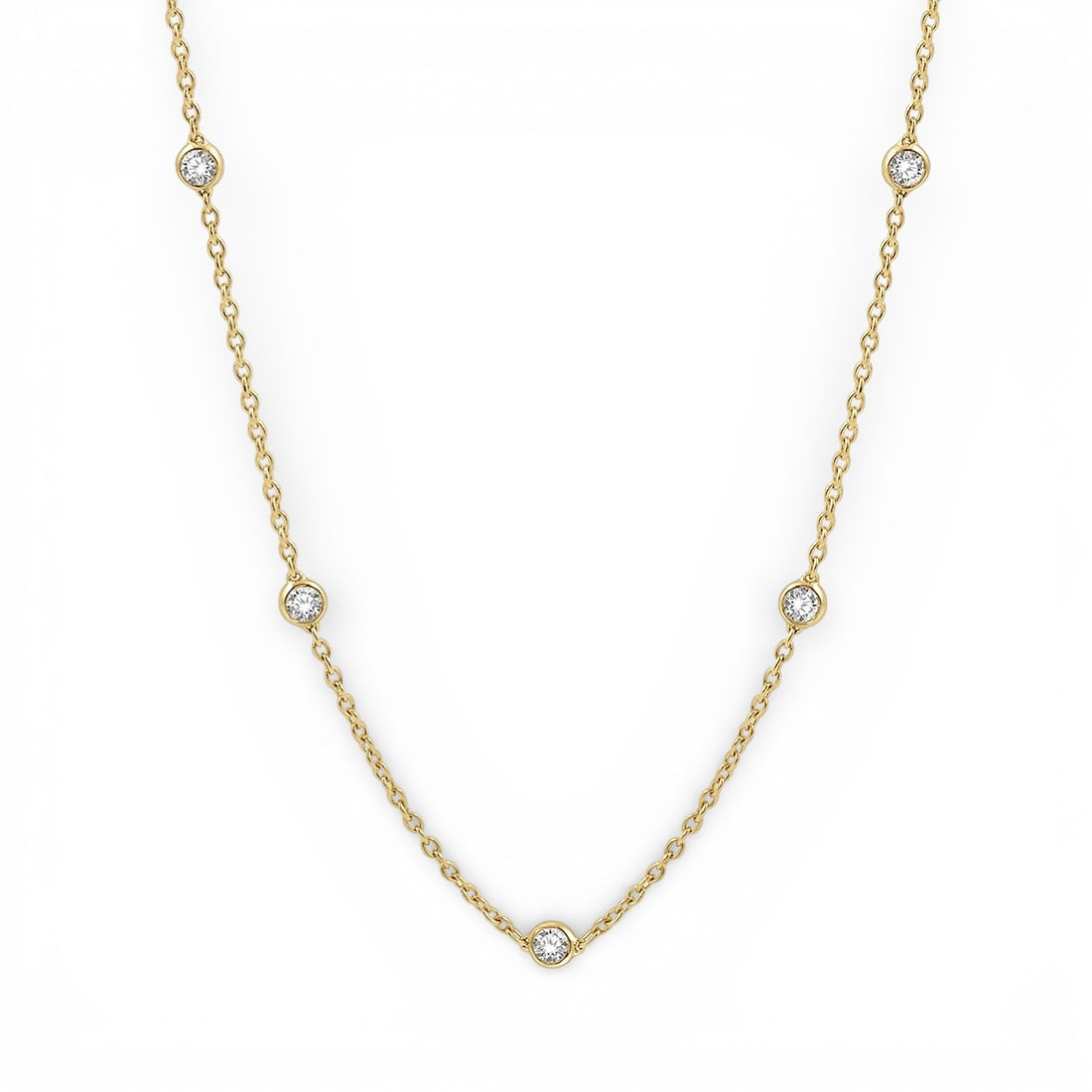 2.04 ctw White Diamond Station 14K Yellow Gold Necklace: An exquisite masterpiece of haute joaillerie, this elegant Station necklace featuring White Diamond is a true treasure. A detailed Bezel gallery secures the stones, rendered in 3.95 grams of lustrous