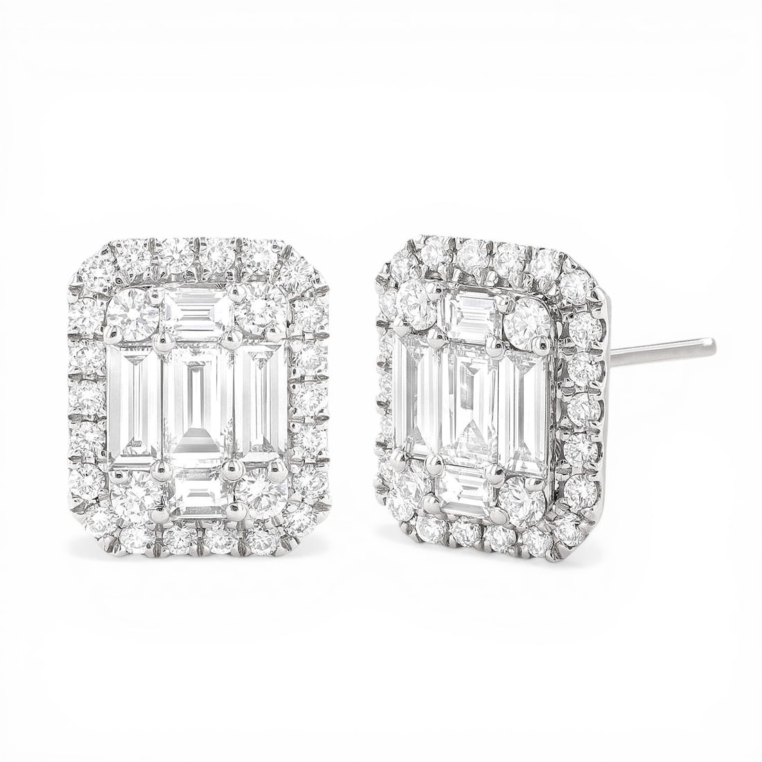 1.39 ctw Baguette and Round Diamond 18K White Gold Stud Earrings: An exquisite masterpiece of haute joaillerie, this breathtaking Empress Classic Stud pair of earrings featuring Natural Diamonds is a true treasure. Crafted with precision, the Halo setting is seamles