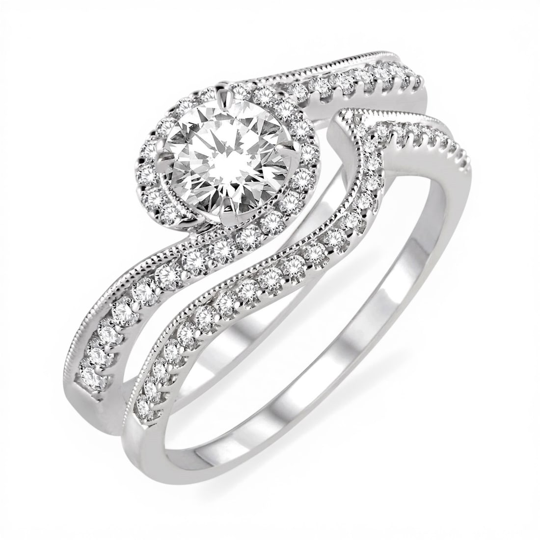 0.59 ctw Diamond Halo Wedding Set 14K White Gold: Epitomizing grandeur, this exquisite Halo set of rings featuring White Diamond stands as a beacon of refined taste. Showcasing the gems in a Halo arrangement, the set of rings consists of 4.2 grams of