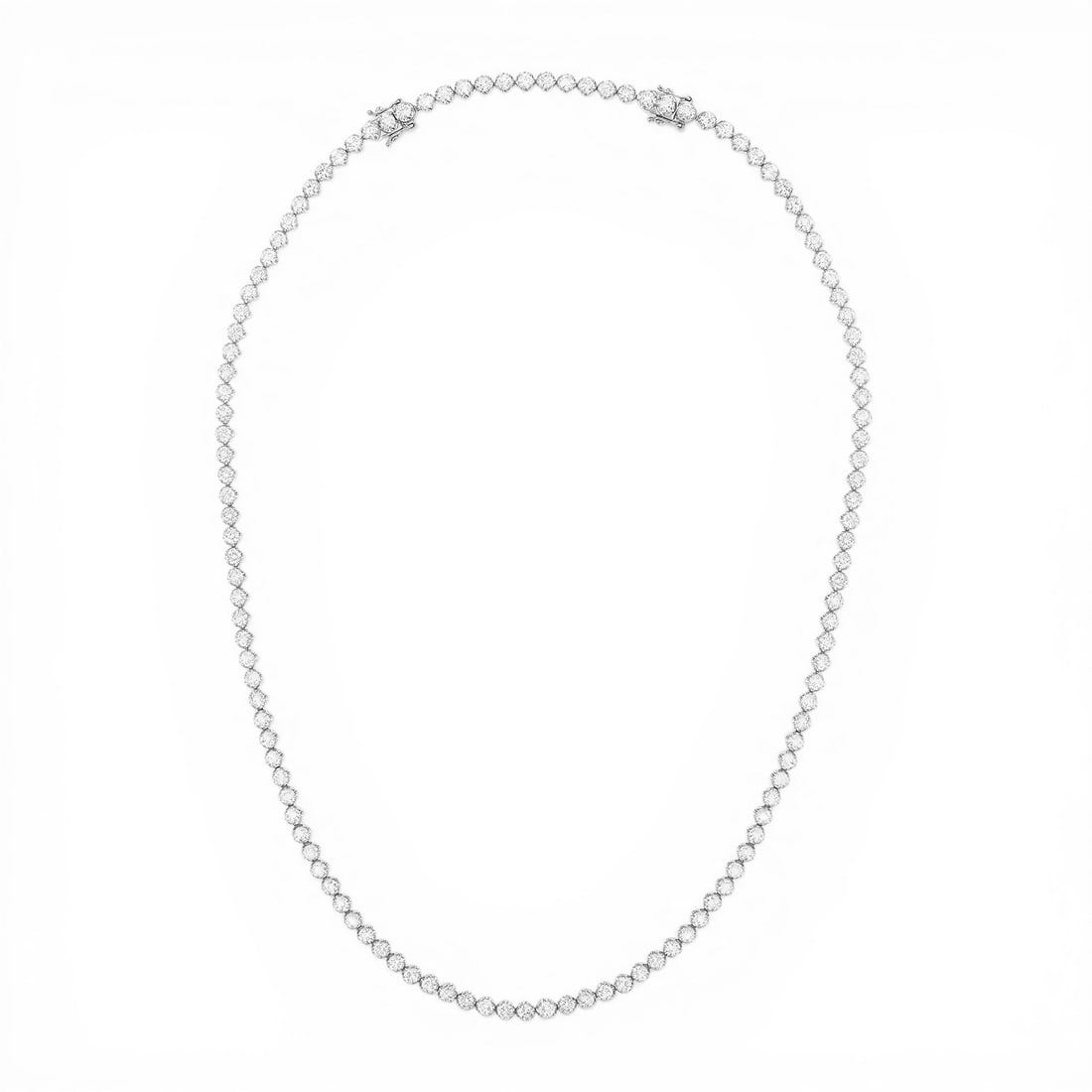 Classic 10.0 ctw Diamond 18K White Gold Tennis Necklace: Timeless and sophisticated, this stunning Classic necklace featuring White Diamond radiates enduring beauty. Expertly mounted in a Tennis setting, the necklace is crafted in 24.05 grams of solid 18K W