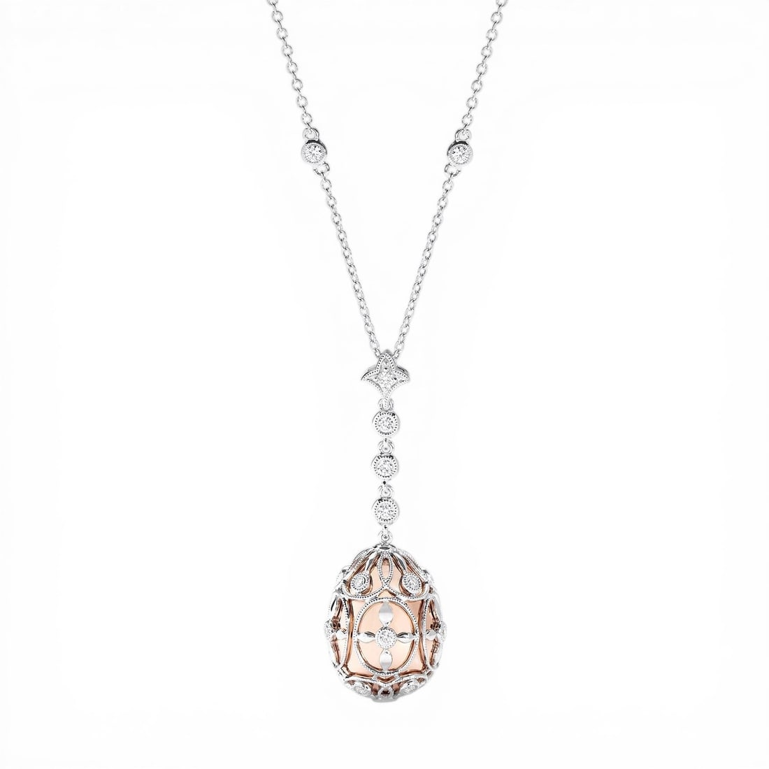 0.64 ctw White Diamond 18K Rose & White Gold Pendant Necklace: A symphony of light and color, this breathtaking Cage Drop pendant necklace featuring White Diamonds embodies the pinnacle of luxury. Expertly mounted in a Drop setting, the pendant necklace is crafte