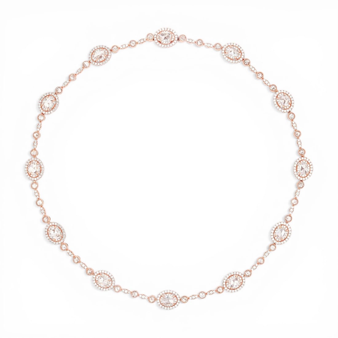 12.11 ctw Diamond Mademoiselle Station 18K Rose Gold Necklace: Timeless and sophisticated, this exquisite Floral-inspired necklace featuring White Diamond radiates enduring beauty. The gemstones are nestled within a Halo framework, supported by a substantial 32.0