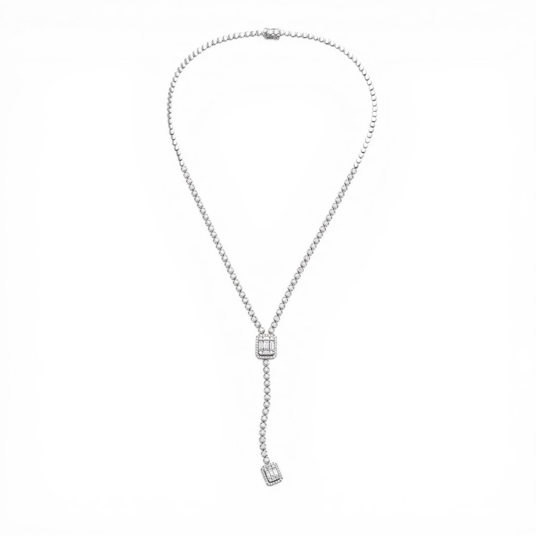 5.26 ctw Diamond Baguette 18K White Gold Lariat Necklace: Exuding opulence and grace, this breathtaking Empress Lariat necklace featuring White Diamond is crafted for the distinguished. Showcasing the gems in a Lariat arrangement, the necklace consists of 25